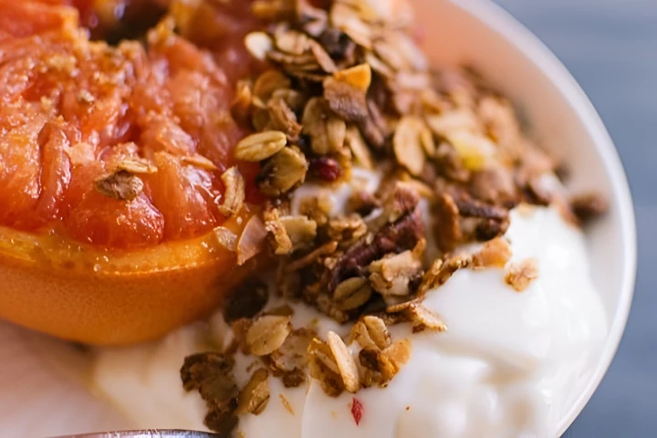 Grapefruit boiled with honey, yogurt, and nuts